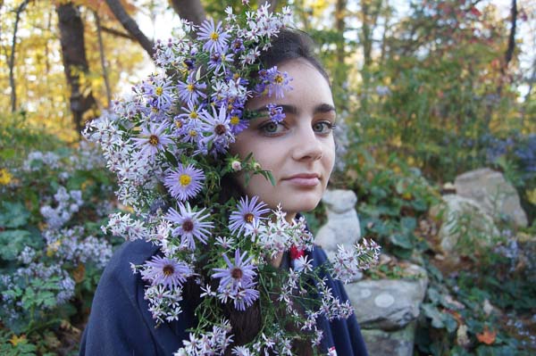 Girl with purple flowers in her hair